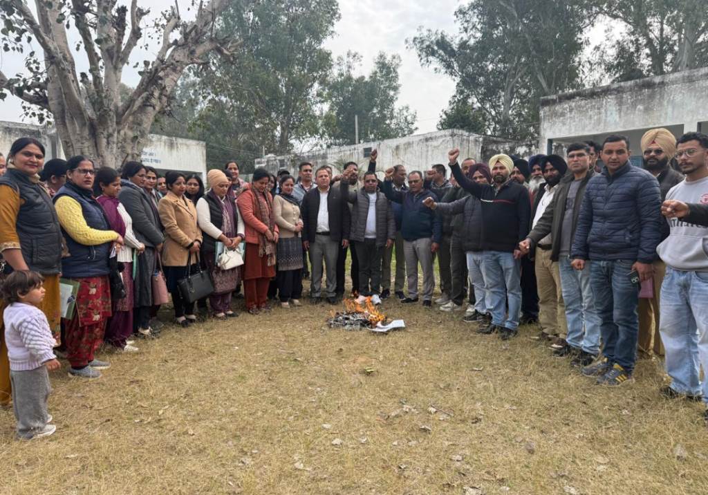 Teachers protest against linking promotions with TET Protest by burning copies of government letters